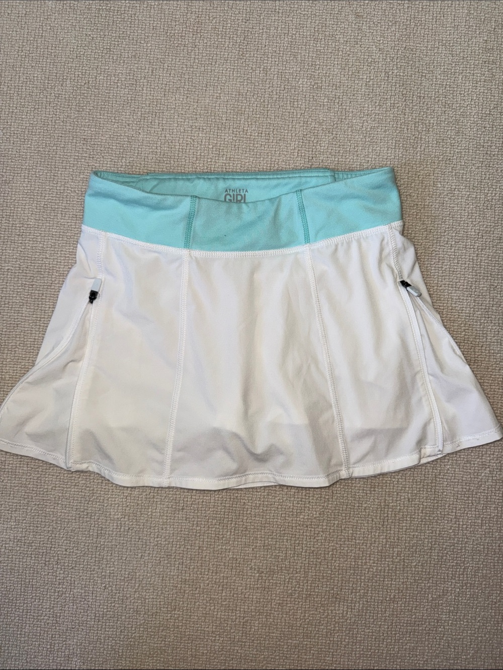 Athleta girl White Skort with Mint Waistband and Zip Pockets. Girls size L (12)